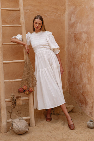 
                  
                    Florence Smocked Linen Midi Dress
                  
                